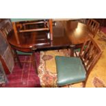 A 19th century mahogany D-end extending dining table, having single drop-in leaf raised on square