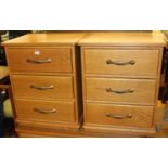 A pair of contemporary light oak three drawer bedside chests, width 53cm