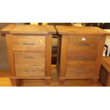 A pair of contemporary light oak three drawer bedside chests, each width 55.5cm