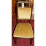 A set of six early 20th century Belgian oak dining chairs, having upholstered pad backs and stuff