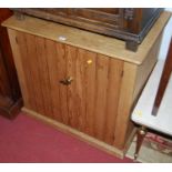 A panelled pine low double door side cupboard, width 78cm