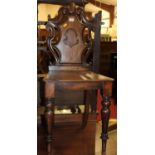 A mid-Victorian mahogany panelled seat single hall chair