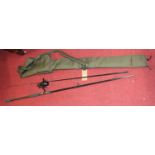 A split cane fishing rod housed in canvas bag