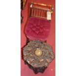 A late Victorian turned walnut framed revolving music stool, having dralon buttoned upholstered