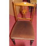 A pair of Edwardian rosewood and floral satinwood inlaid salon side chairs