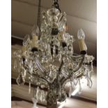 An early 20th century cut crystal glass eight light hanging electrolier, approx drop 60cm