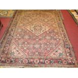 An Afghan woollen Bokhara hall runner, having a brown ground and multiple trailing borders, with