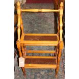 A turned beech and gilt tooled leather inset portable set of library steps, width 47cm