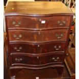 A flame mahogany and cross banded serpentine front chest of four long drawers, width 61cm