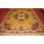 A worsted pile Samira woollen carpet, having a brown ground decorated with flowers and foliage,