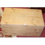 A close nailed pine boarded oak hinge top tool chest, having iron end carry handles, width 69cm