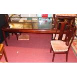 A contemporary Chinese hardwood dining suite comprising; round cornered extending dining table