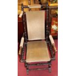 A circa 1900 American rocking armchair, together with a late Victorian walnut framed and cane back