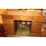 A Victorian mahogany and gilt tooled red leather inset twin pedestal writing desk, having typical