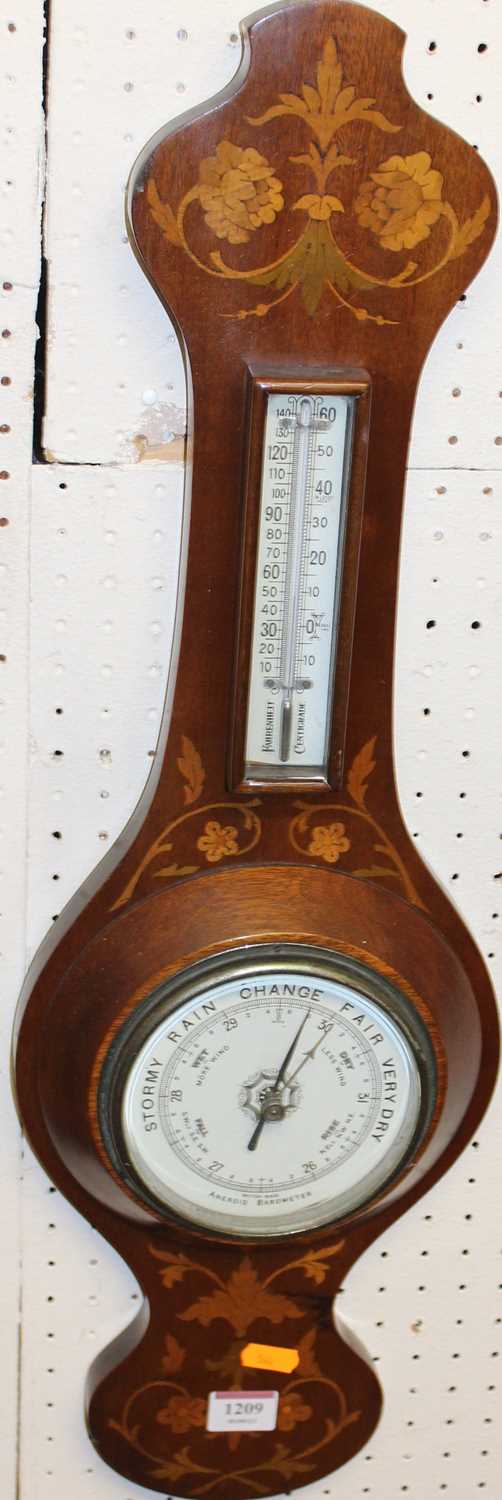 An Art Nouveau mahogany and floral satinwood inlaid two dial aneroid wheel barometer, height 68cm