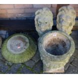 A pair of reconstituted stone ornamental garden seated lions, height 57cm, together with a single