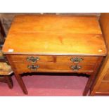 A George III fruitwood three drawer low boy having canted corners, width 74cm