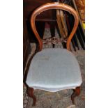 *Two sets of four* mid-Victorian faded mahogany balloon back salon chairs, each having pale blue