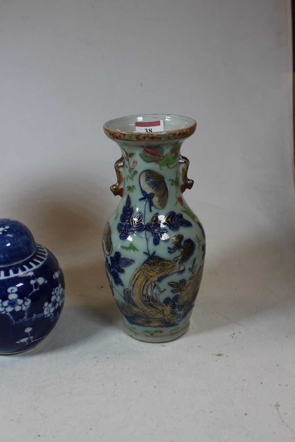 A pair of stoneware vases, each of baluster form, enamel decorated with various birds, butterflies - Image 9 of 13