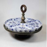 A Villeroy & Boch blue and white four-section hors d'oeuvres dish, on a lazy Susan type revolving