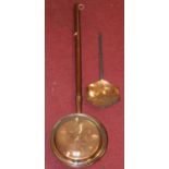 A copper warming pan; together with a copper skimmer (2)