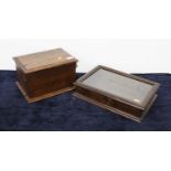 A 1920s oak box, of rectangular form, the hinged lid opening to reveal partitioned interior, w.30cm;