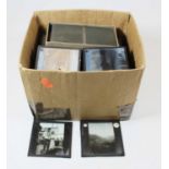 A collection of assorted magic lantern slides to include boxed Paget Plates slow lantern slides,