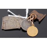 A Chinese gold miniature coin; together with a three-penny piece (drilled); a Belgian white metal