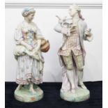 A pair of large early 20th century continental bisque figures, the gentleman in standing pose with