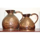 A large 19th century copper flagon, h.37cm; together with one other smaller example (2)