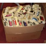 A box of modern issue diecast toy vehicles