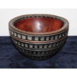 A turned thuya wood bowl, with banded decoration to the exterior, dia.21cm