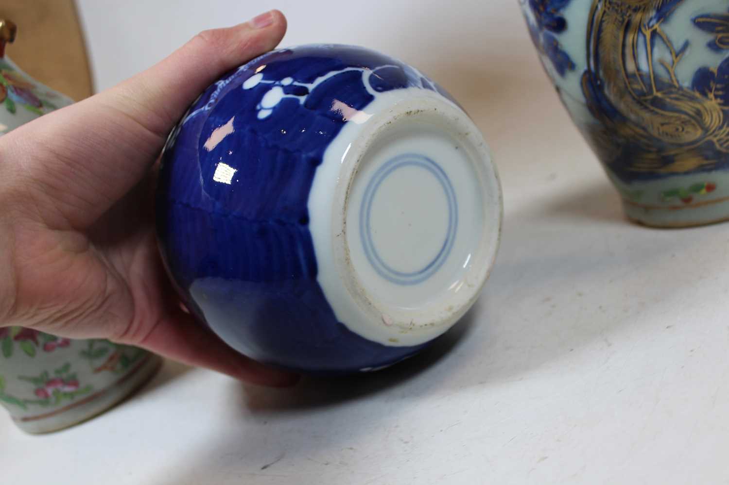 A pair of stoneware vases, each of baluster form, enamel decorated with various birds, butterflies - Image 8 of 13