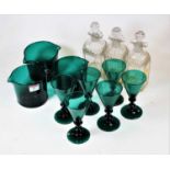 A set of three 19th century cut glass decanters and stoppers; together with a set of six green