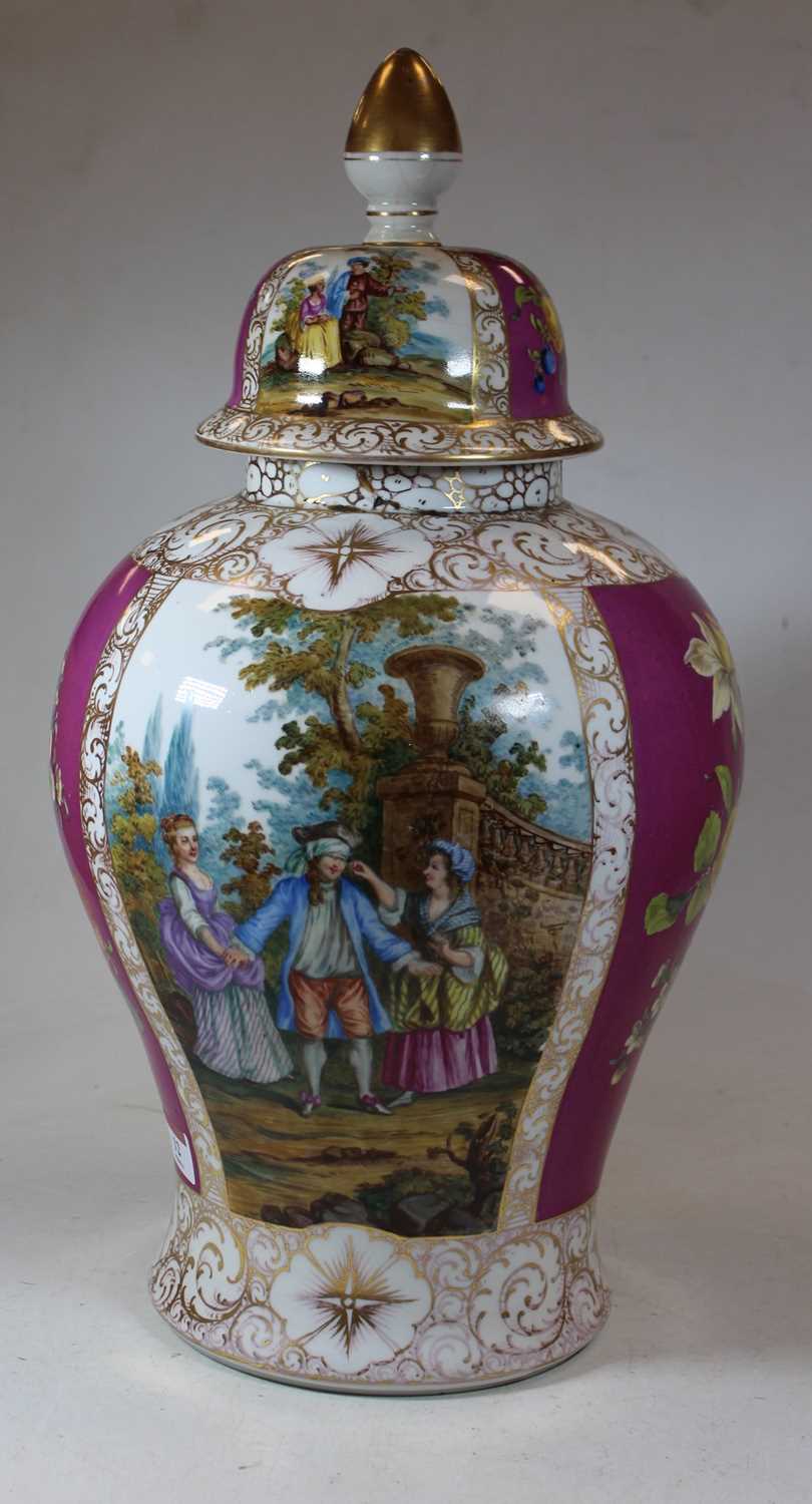 A large early 20th century German porcelain vase and cover, of baluster form, decorated with figures - Image 2 of 12