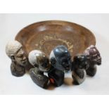 A collection of assorted carved and polished hardstone busts, and a wooden bowlCondition report: One