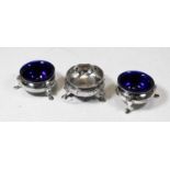 A pair of Victorian silver open salts, of squat circular form with engraved decoration, with