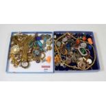 A collection of miscellaneous costume jewellery to include faux pearl necklace, gilt metal bracelet,