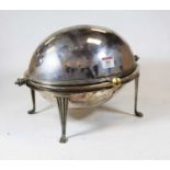An early 20th century silver plated breakfast dish, the domed revolving cover revealing a pierced