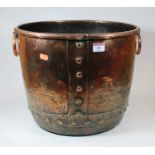 A 19th century copper log bin, of riveted construction, having ring handles, h.30cmCondition report: