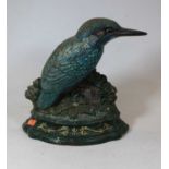 A cast iron doorstop in the form of a kingfisherCondition report: Height 27cm.Some paint chips.Small