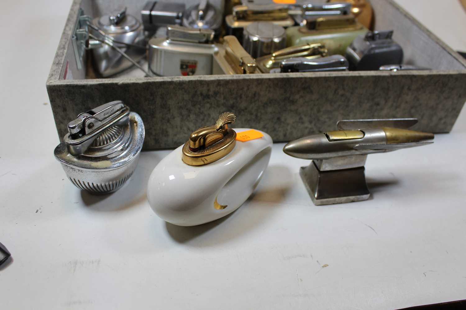 A collection of assorted table cigarette lighters to include chromed and brass novelty example in - Image 2 of 4