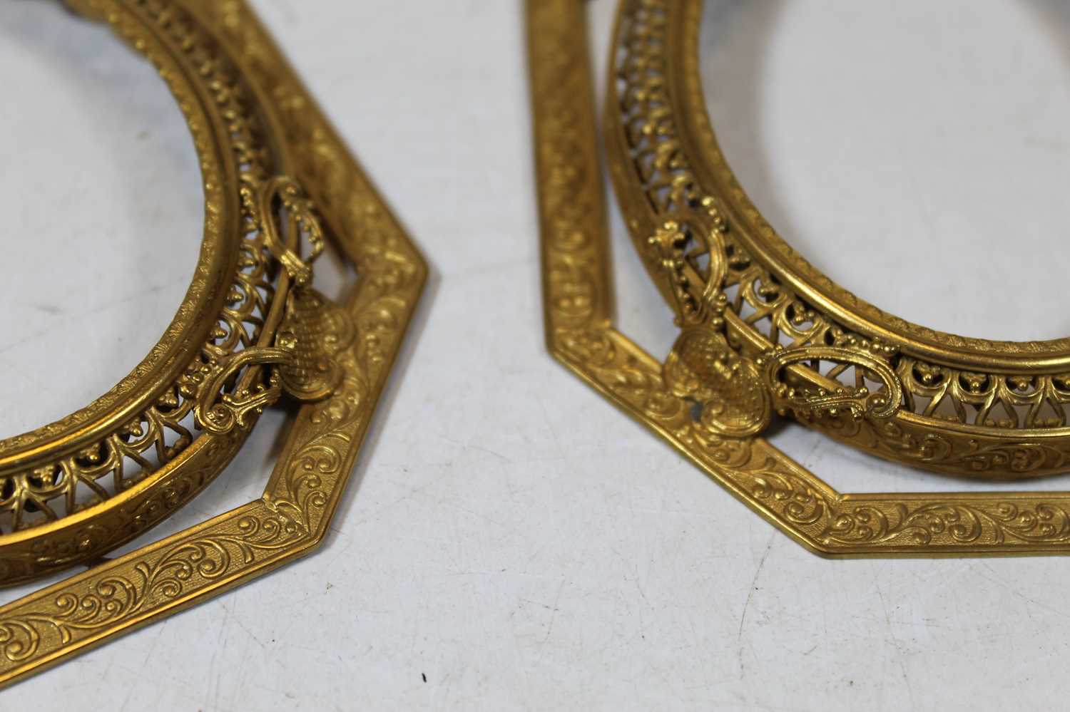 A pair of late 19th century gilt metal frames, each of octagonal form with scrolling floral - Image 2 of 4