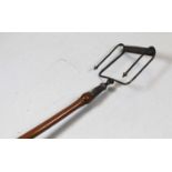 A George V silver and boxwood toasting fork/holder, London 1931, length 48cm