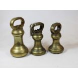 A set of three early 20th century brass bell weightsCondition report: Weights – 3.5kg, 1810.8g,