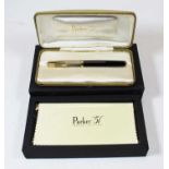 A Parker '51' special edition pen, having black barrel with gilt cap and clip, in original box and