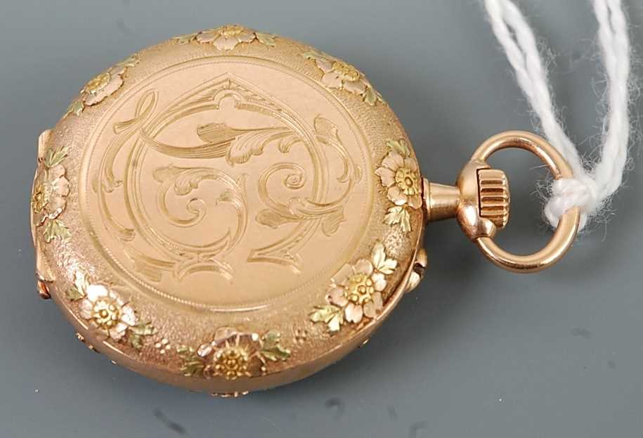 A continental lady's two-colour gold cased open faced pocket watch, the engraved and floral chased - Image 2 of 3