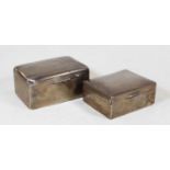 A late Victorian silver clad table cigarette box of rectangular form having hinged dome cover,