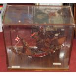 A scratch built model of the Golden Hind within glazed display case