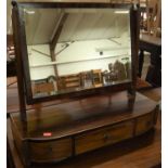 A 19th century mahogany swing dressing table mirror, raised on bowfront three drawer box base, width